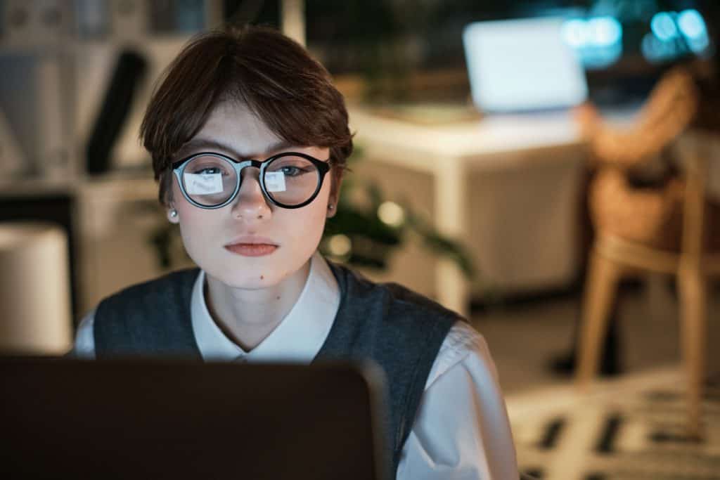 Businesswoman working on latop at office